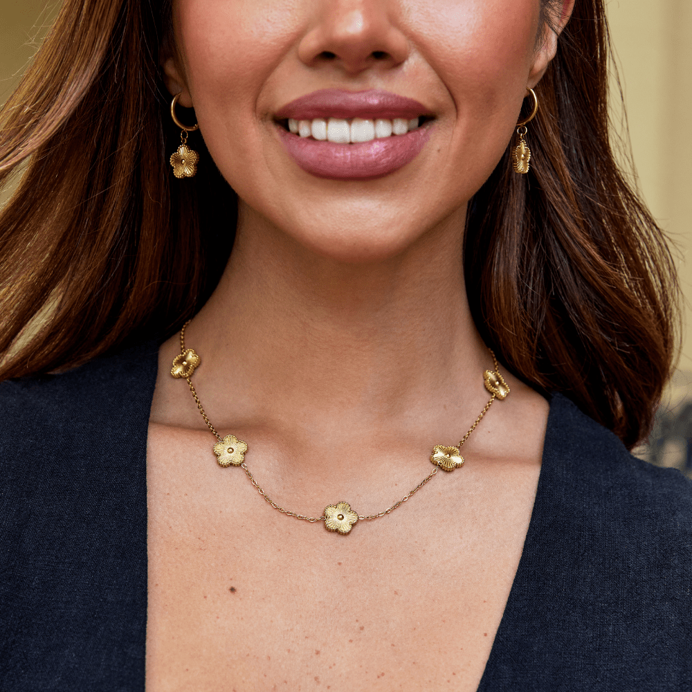 Gouden klavertjevier clusterketting