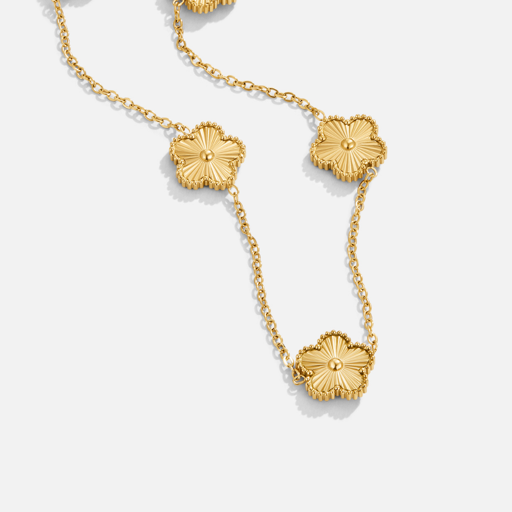 Gouden klavertjevier clusterketting